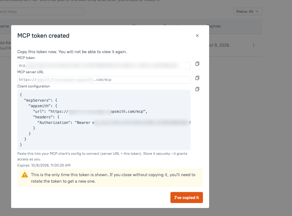 MCP token created window with one-time token, server URL, client configuration, and expiration date